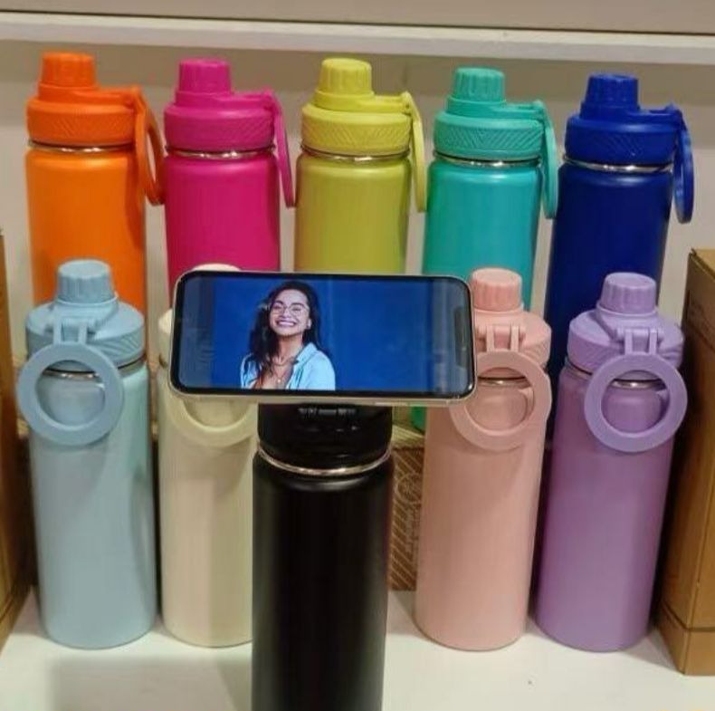 Termo de 18 oz con aro magnetico que sostiene el celular, surtido de colores