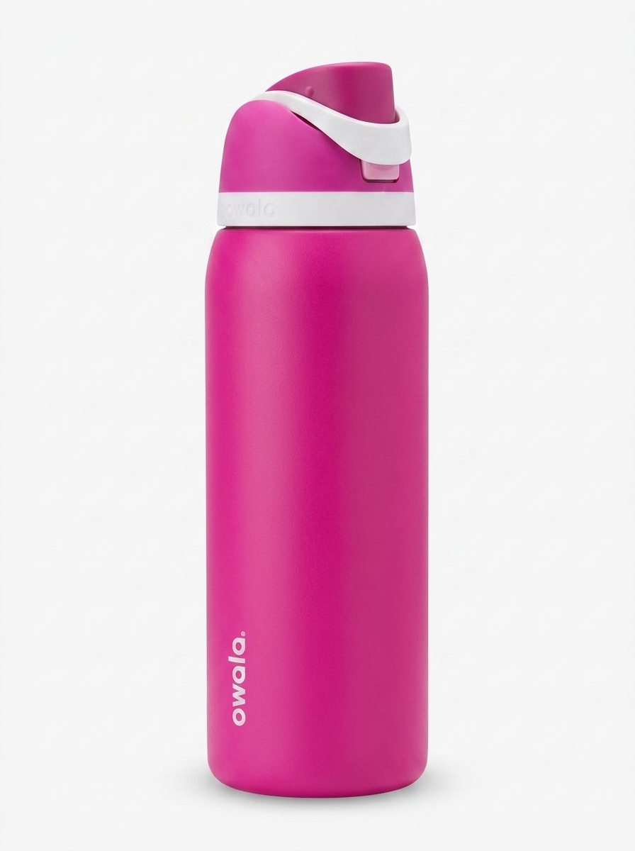 Botella térmica Owala FreeSip de 32 onzas en color fucsia vibrante. Tapa en tonos fucsia y blanco con boquilla FreeSip. Cuerpo de acero inoxidable con aislamiento al vacío de doble pared.