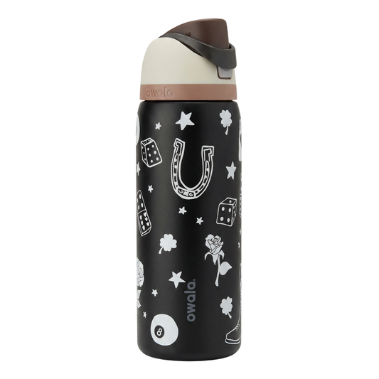 Botella térmica Owala FreeSip de 32 onzas en color negro mate con gráficos de temática vaquera (herradura, dados, rosa y estrellas) en color blanco.