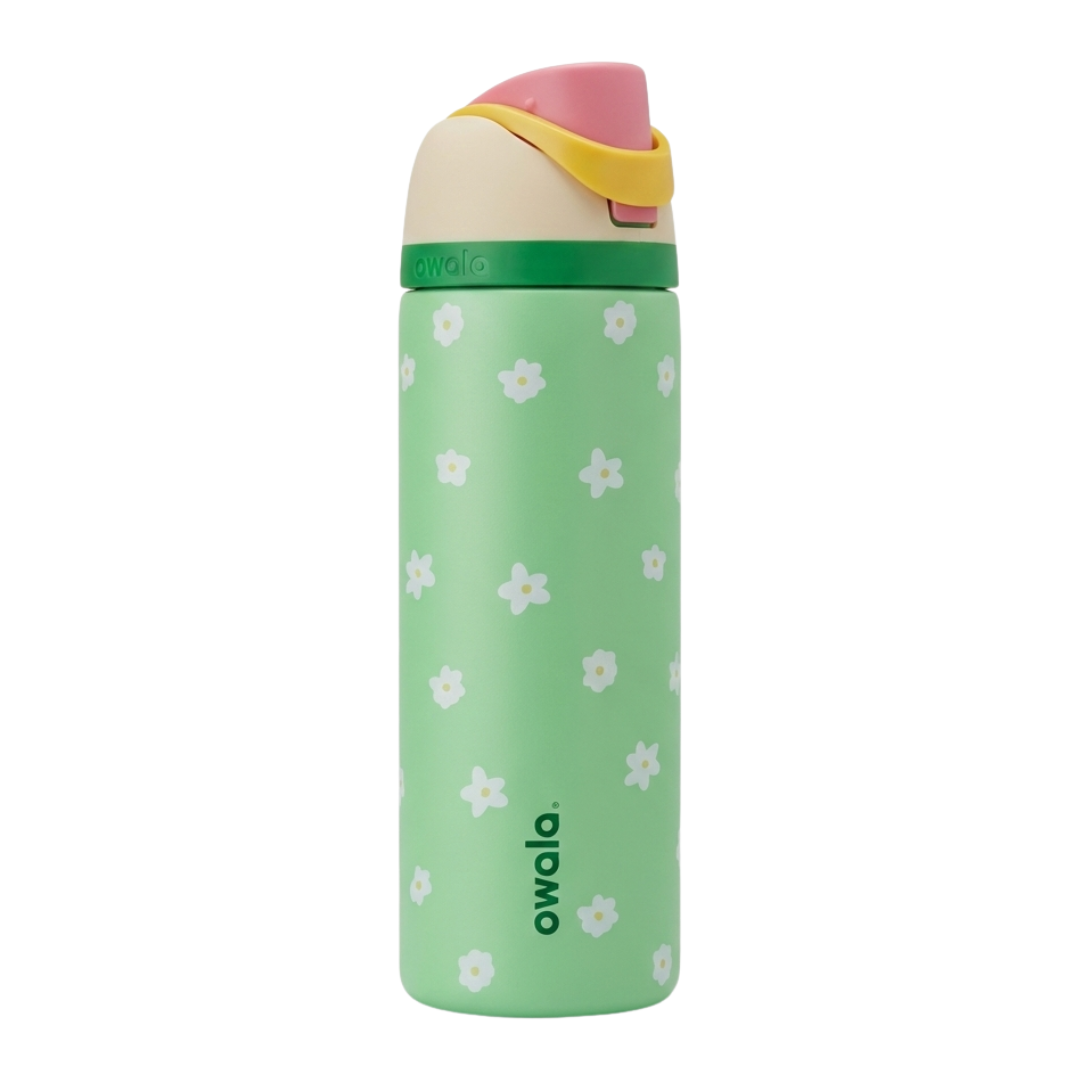 Botella térmica Owala FreeSip de 32 onzas en color verde claro mate con un patrón de pequeñas flores blancas con centro amarillo.