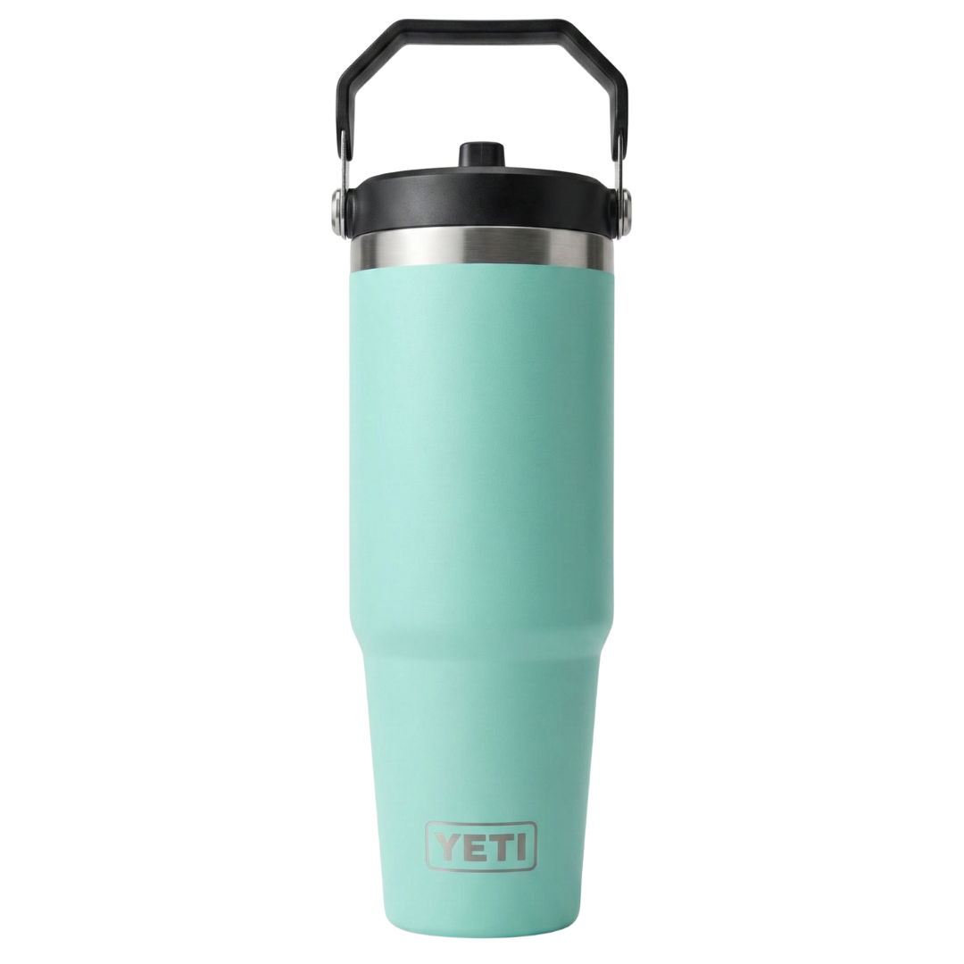 Vaso térmico Yeti Rambler de 30 onzas en color aqua (Seafoam) con acabado Duracoat mate. Incluye tapa Straw Lid con sorbete transparente y asa de transporte superior abatible en color negro. Cuerpo de acero inoxidable de doble pared con el logotipo de Yeti grabado en la base.